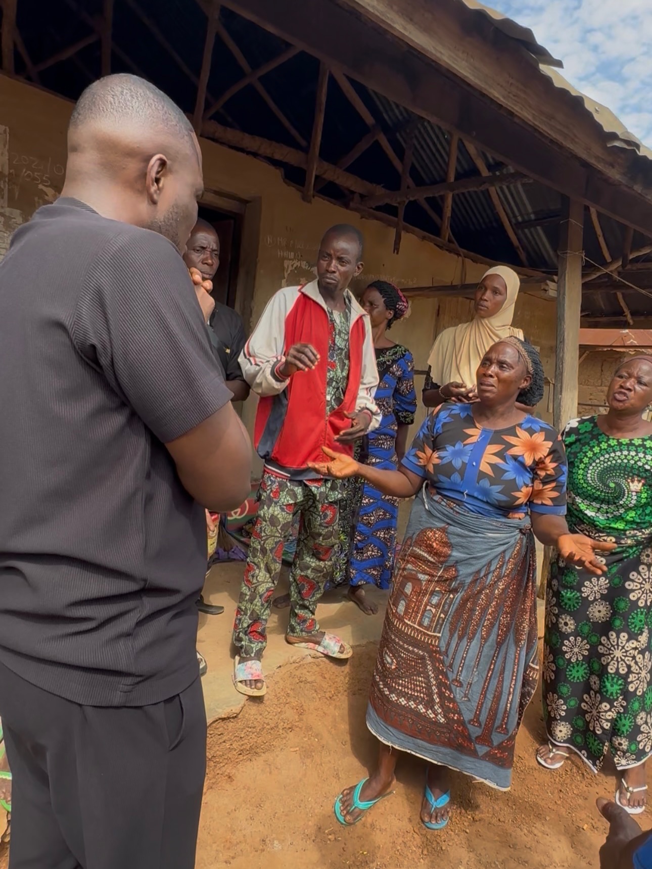 Chude Jideonwo speaking with women in a remote village